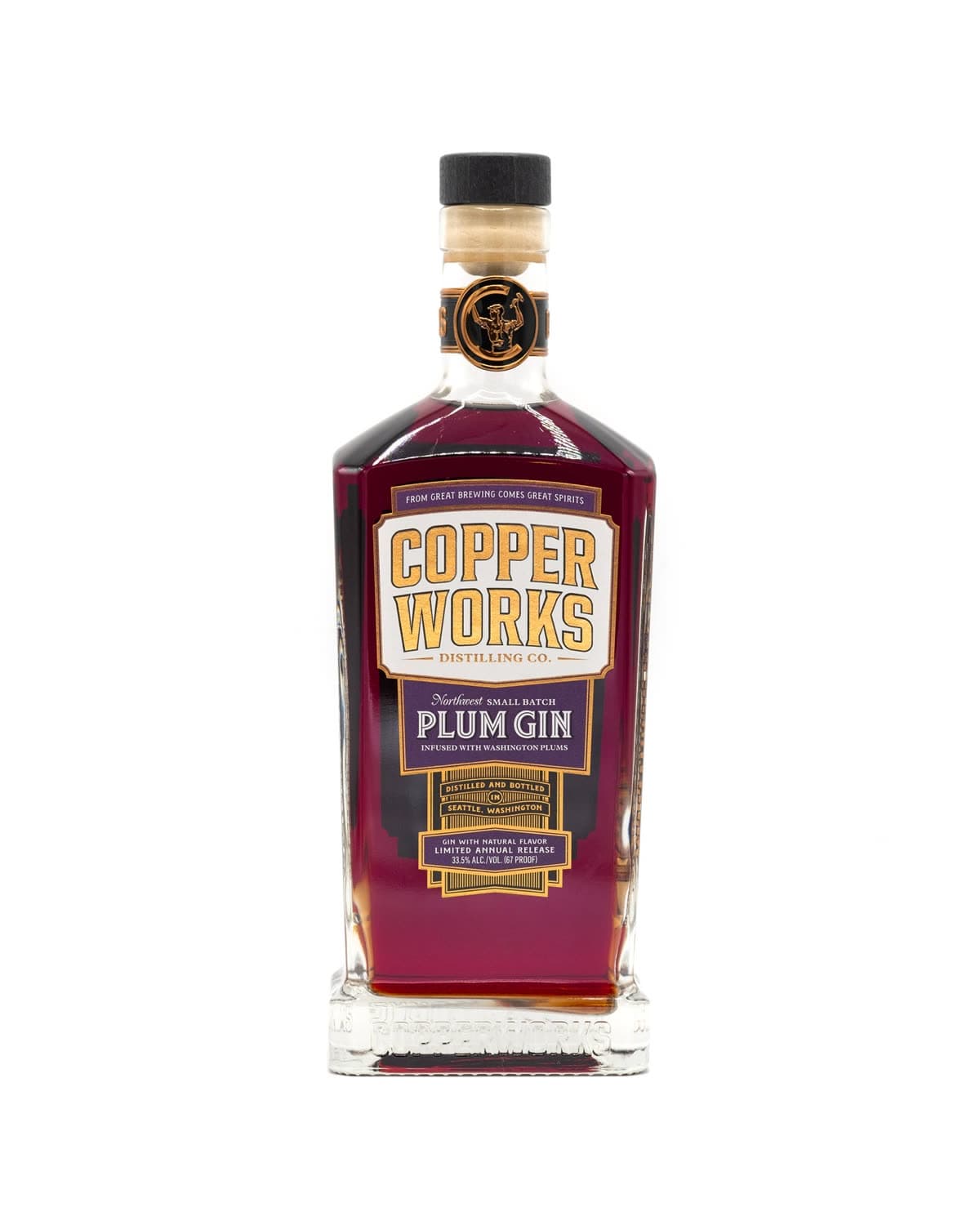 A bottle of ruby-coloured Copperworks Plum Gin on a white background.