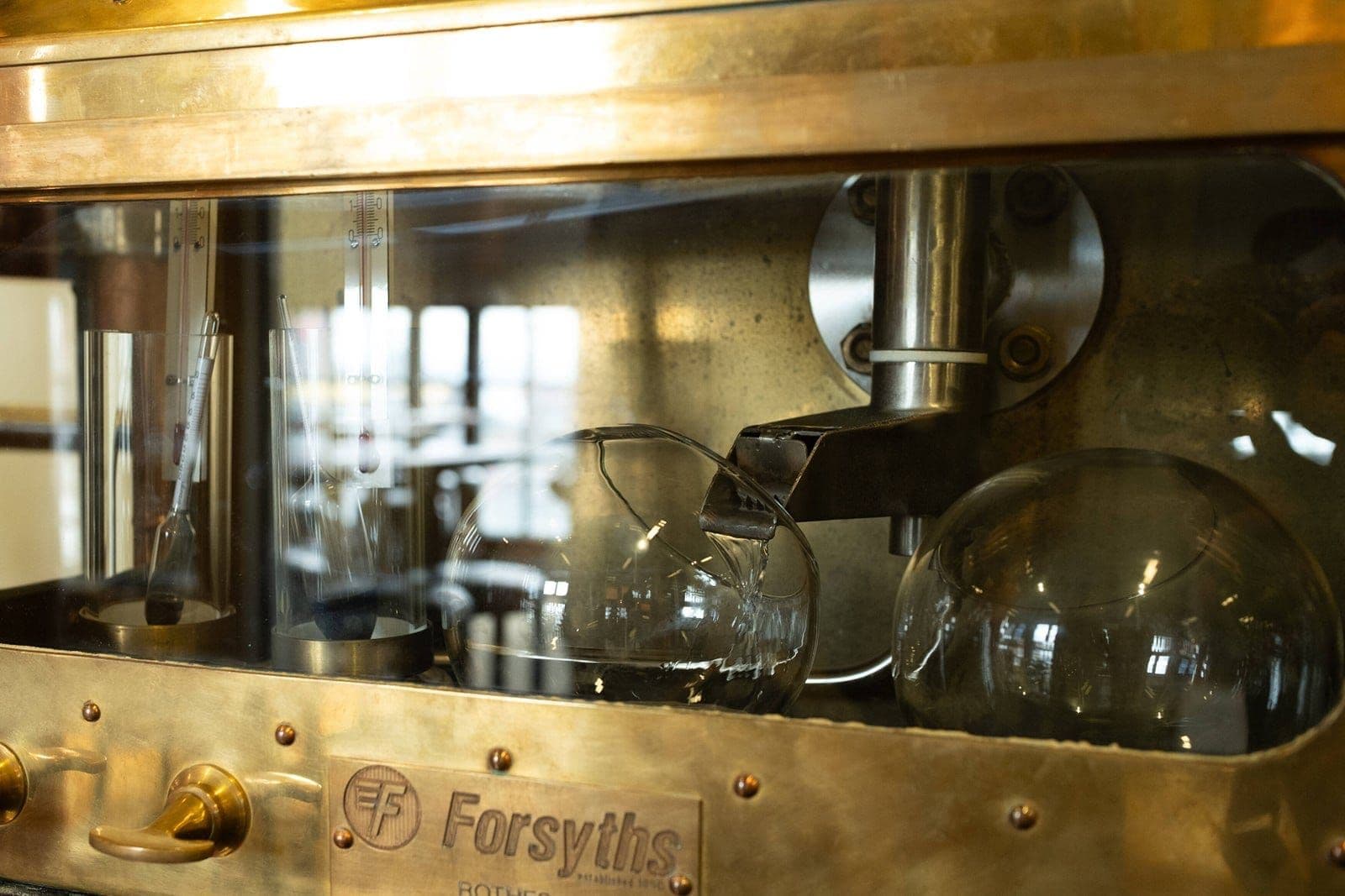 The sight glass on the Copperworks column still, where the vodka is distilled.