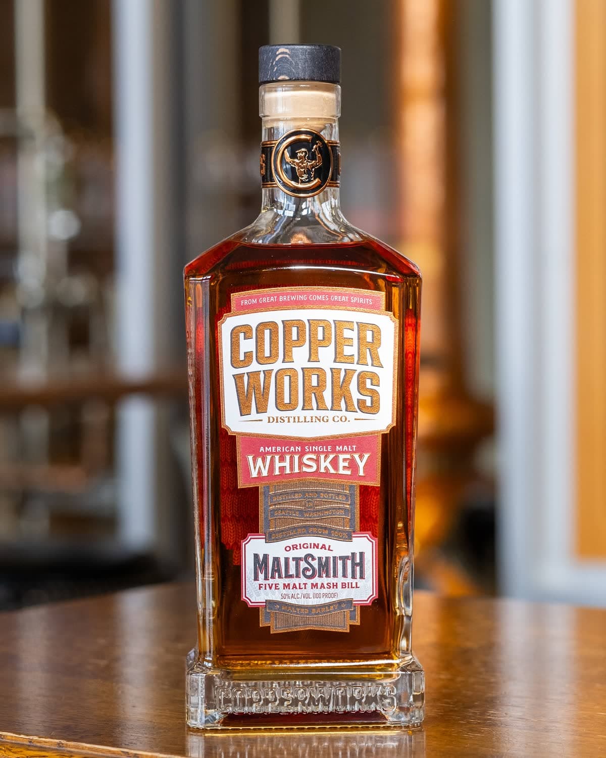 A bottle of Copperworks Maltsmith American Single Malt Whiskey.