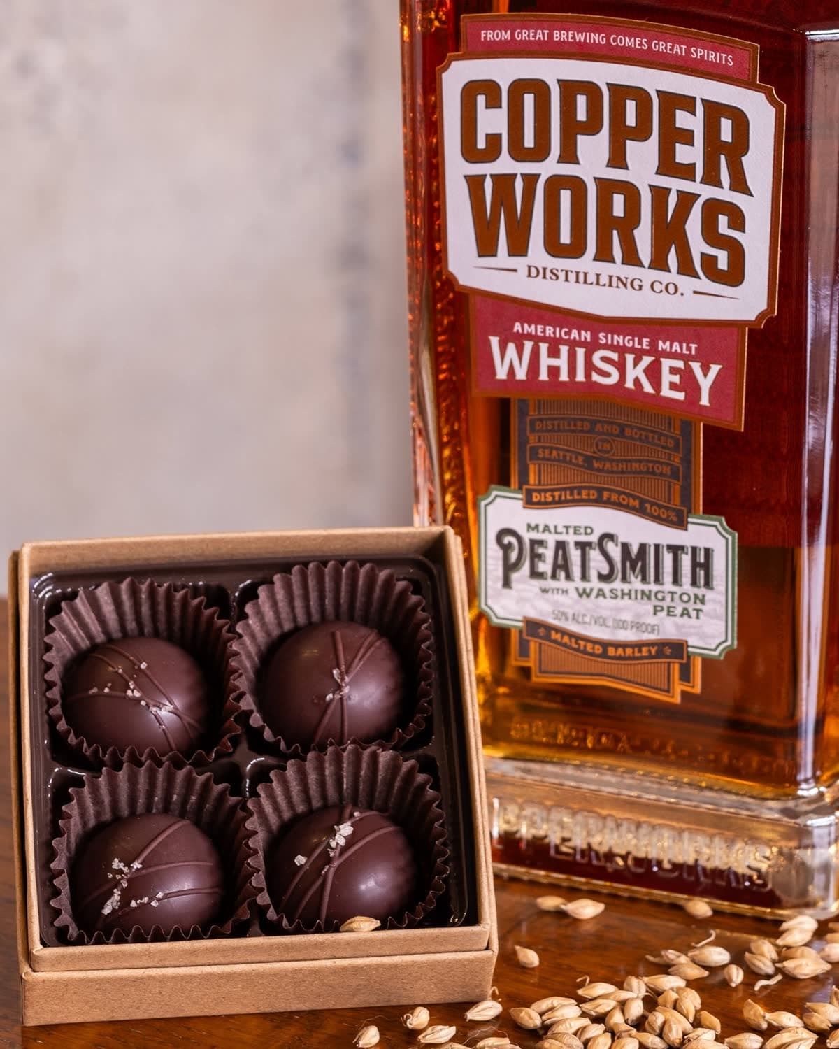 Copperworks Peatsmith American Single Malt Whiskey with rosemary caramels.